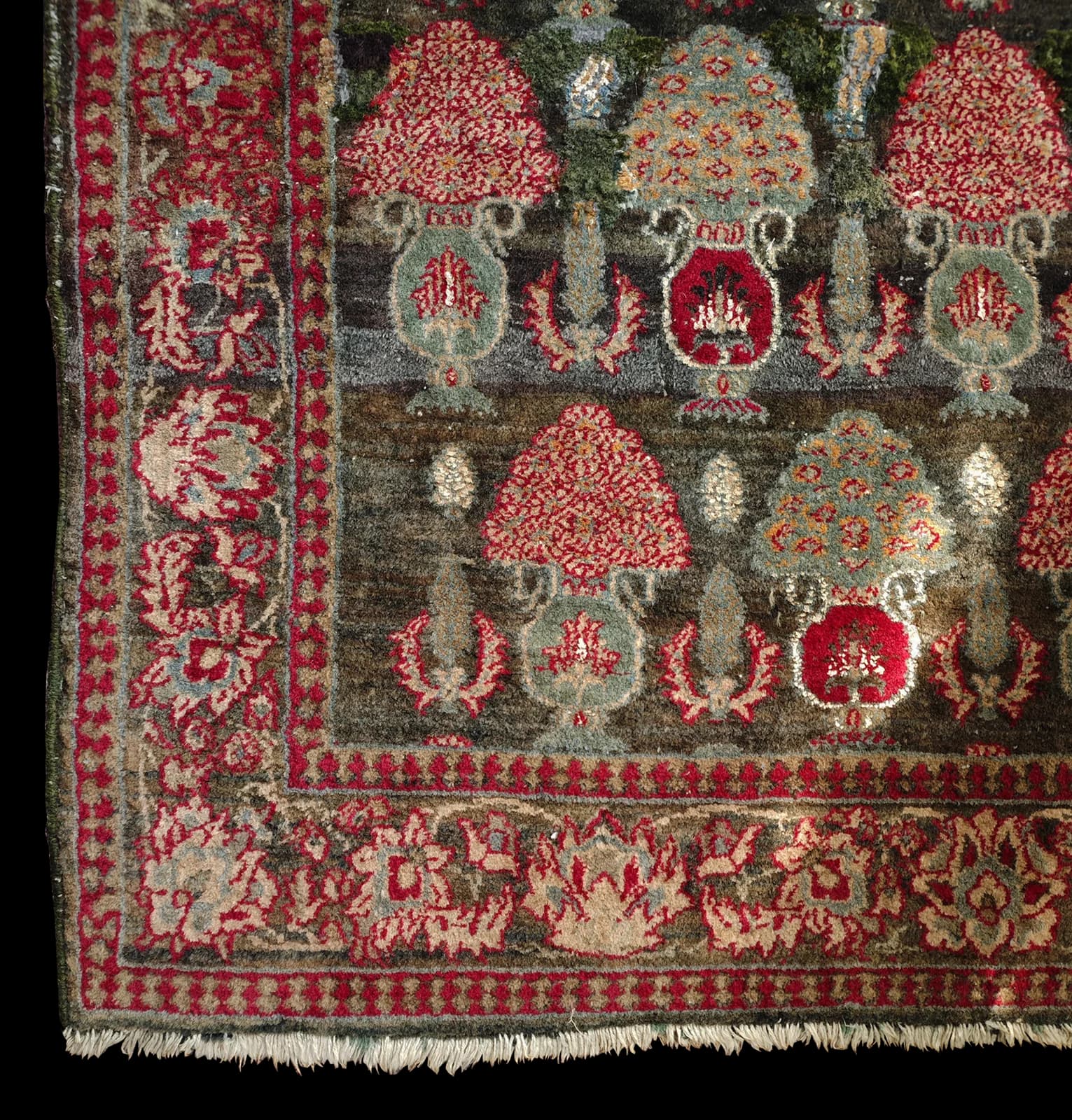 Corner detail of a hand-knotted Kashmiri carpet